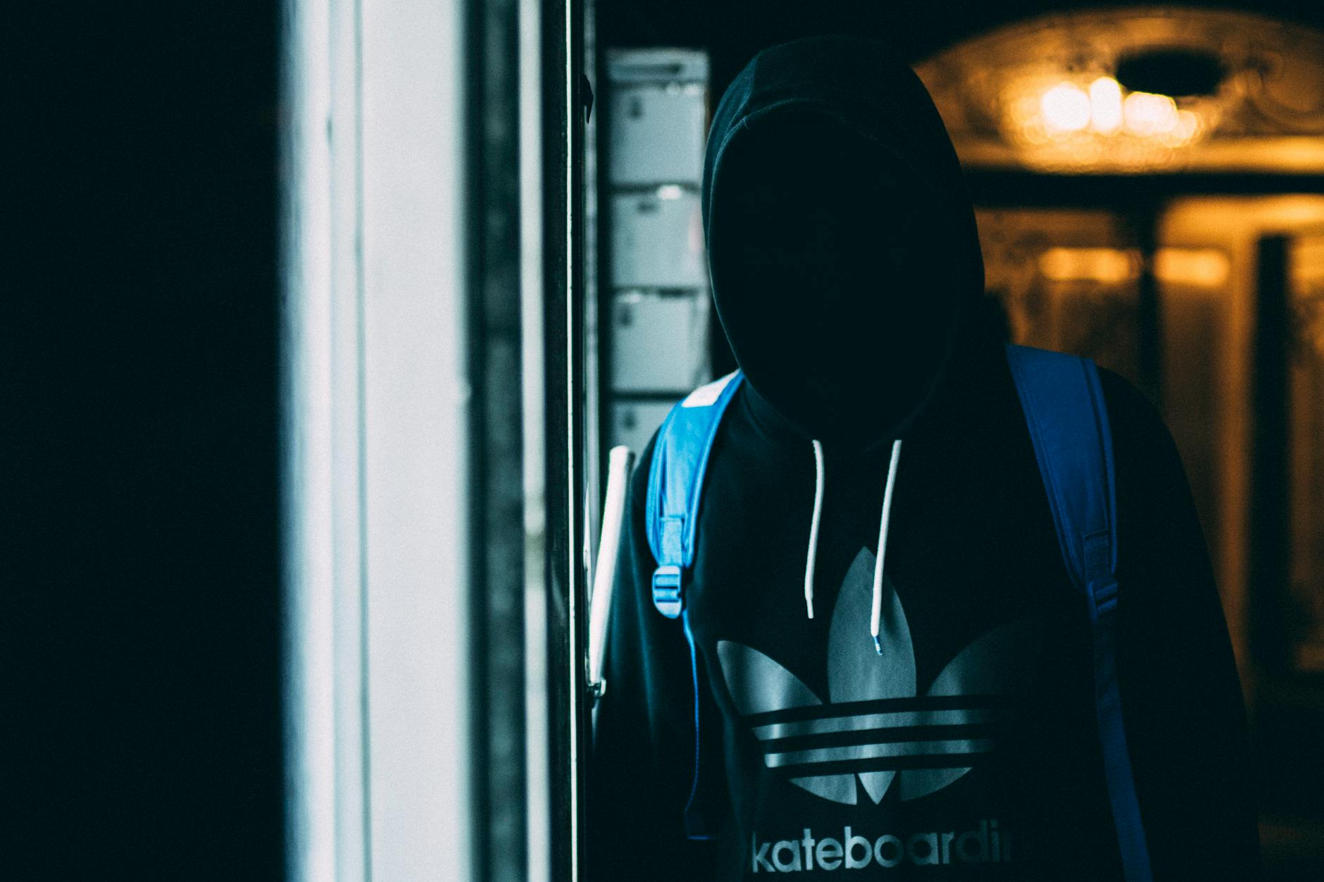 person wearing adidas hoodie during daytime